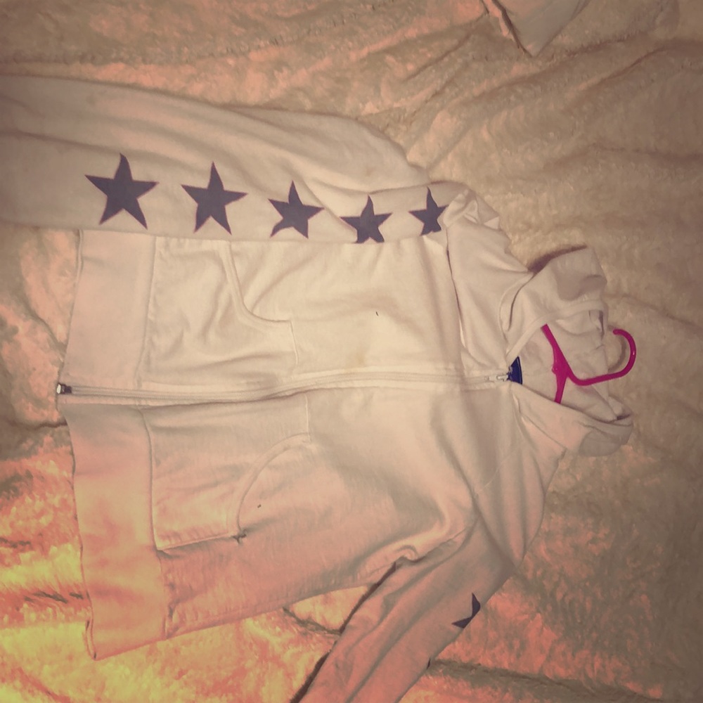 A zip up white jacket